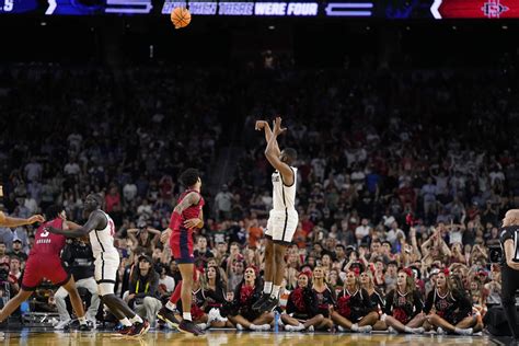 A look back at some of the greatest buzzer-beaters in March Madness history